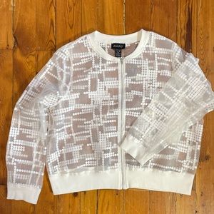 Sheer white Ashro zip bomber style top with geometric pattern. Size 1X